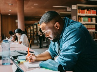 College student working in the library